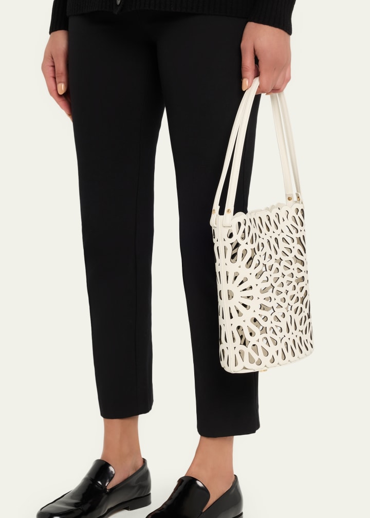 Laser-cut leather bucket shoulder bag