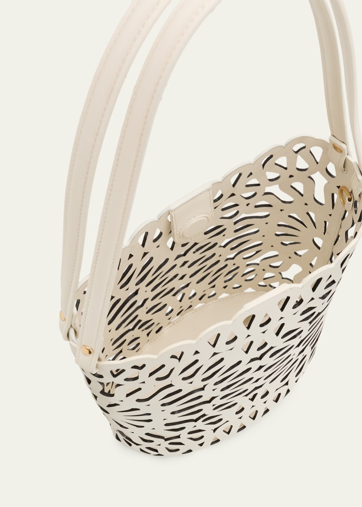 Laser-cut leather bucket shoulder bag